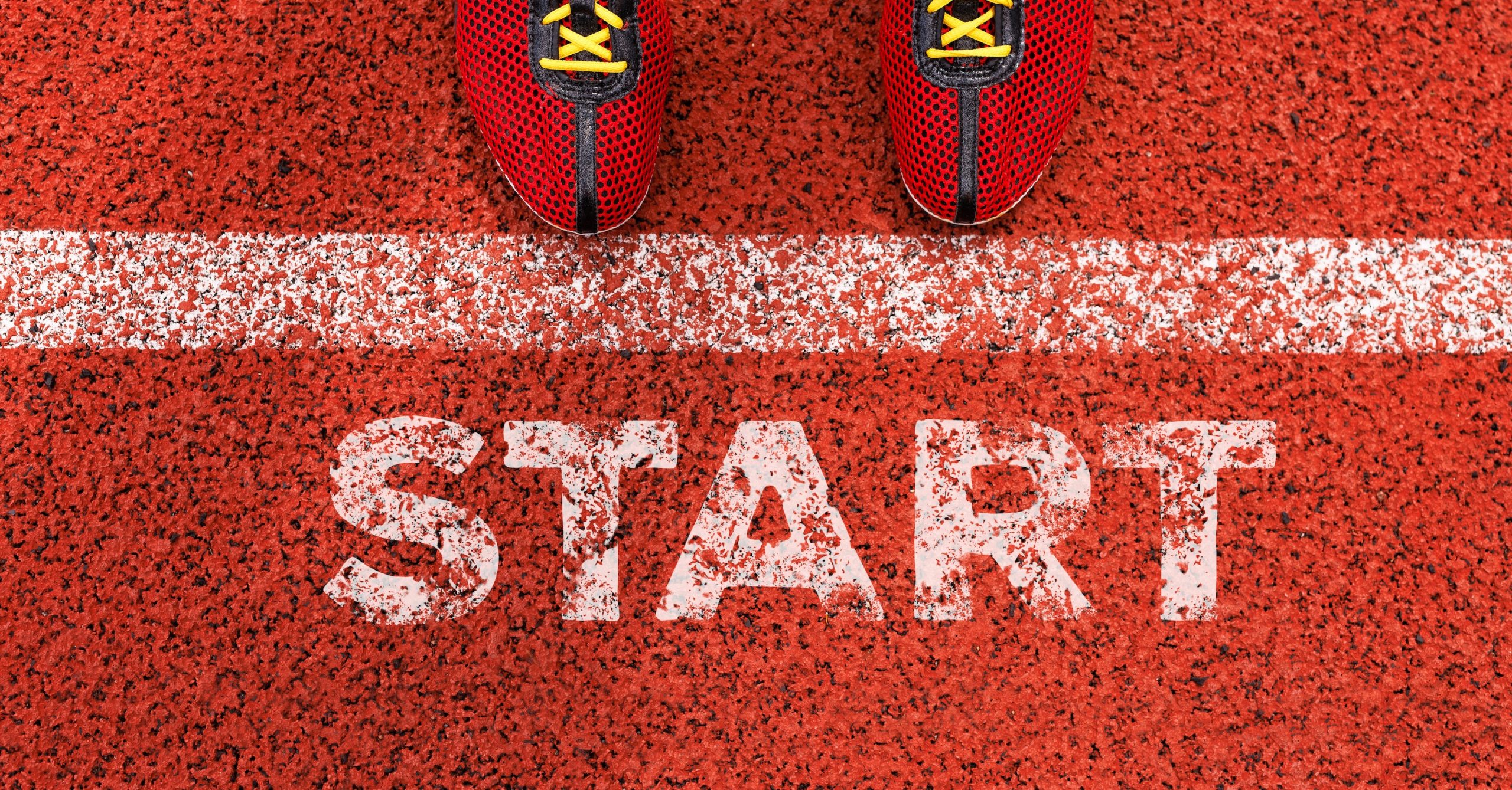 How GO Get Organised started - image showing a start line on an athletics track