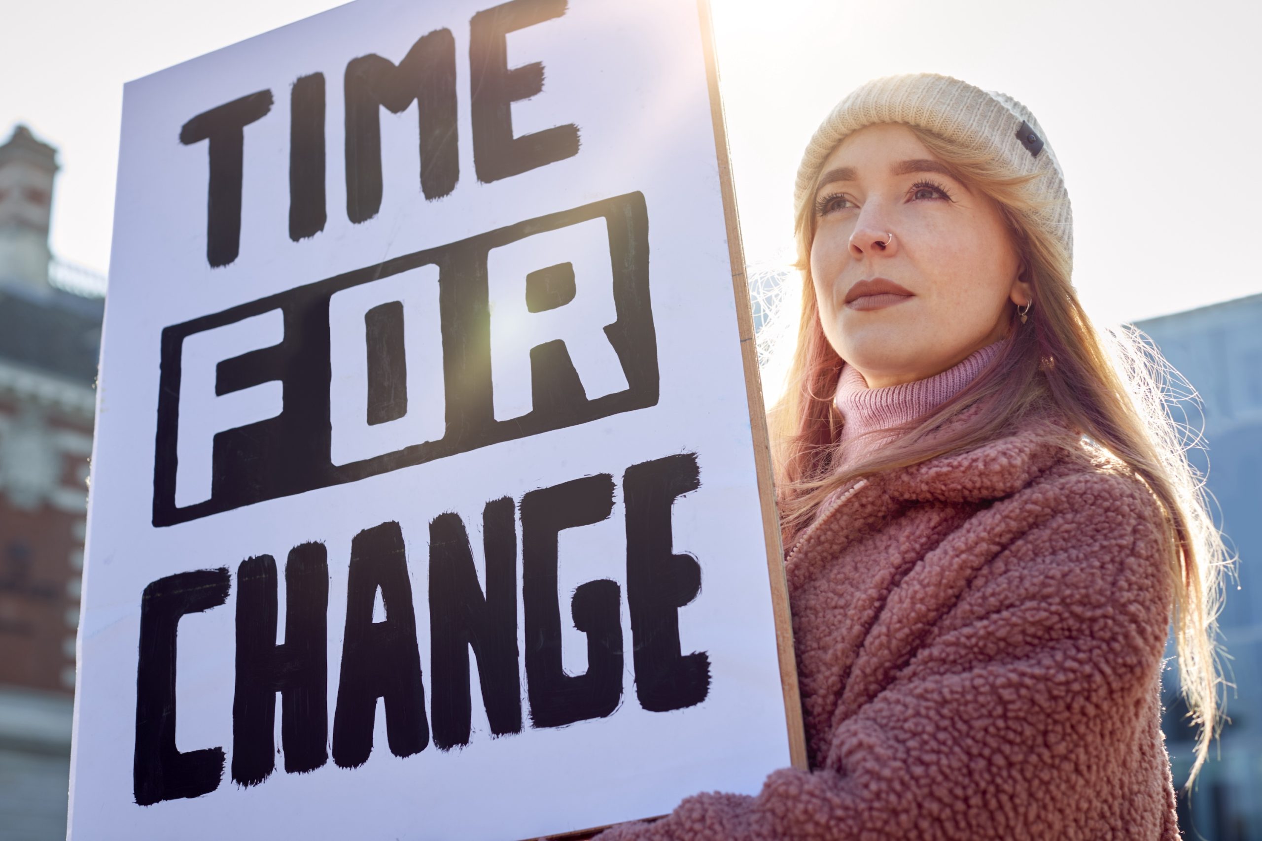 GO Get Organised this new year - time for change blog image of female holding a time for change banner