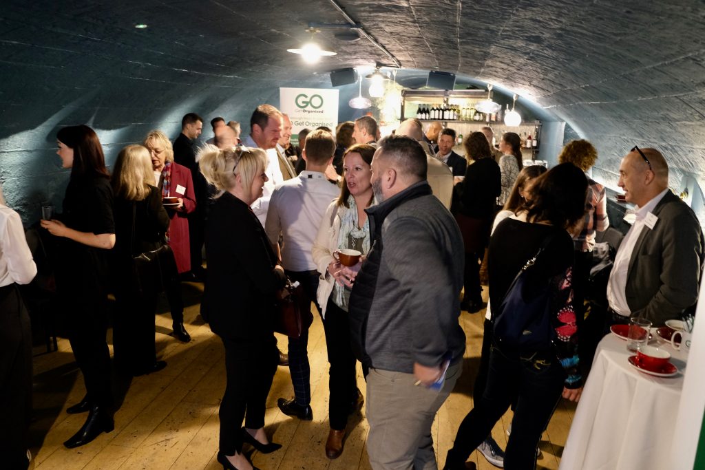 GO Get Networking event organised by GO Get Organised - busy room of people networking