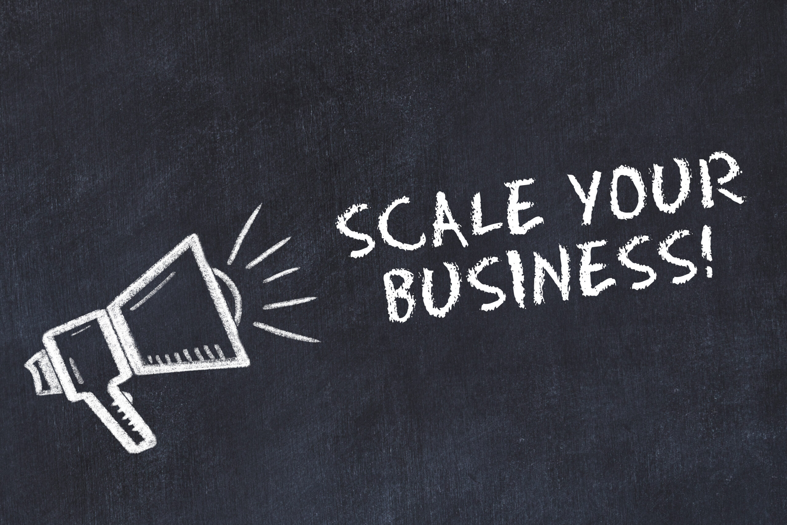 GO Get Organised blog -Scale your business written on blackboard